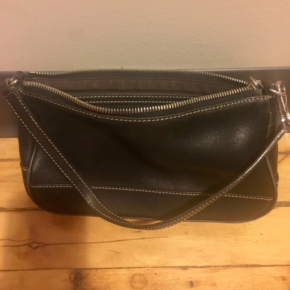 Small black strong calf skin leather coach purse.